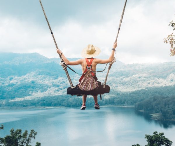 beautiful-girl-enjoying-freedom-on-swing-in-bali-indonesia.jpg